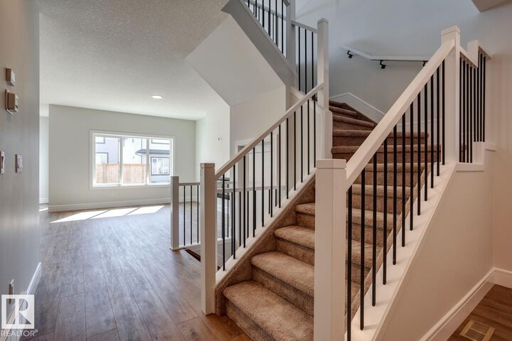 Property Photo:  54 Ficus Way  AB T8L 0Z6 