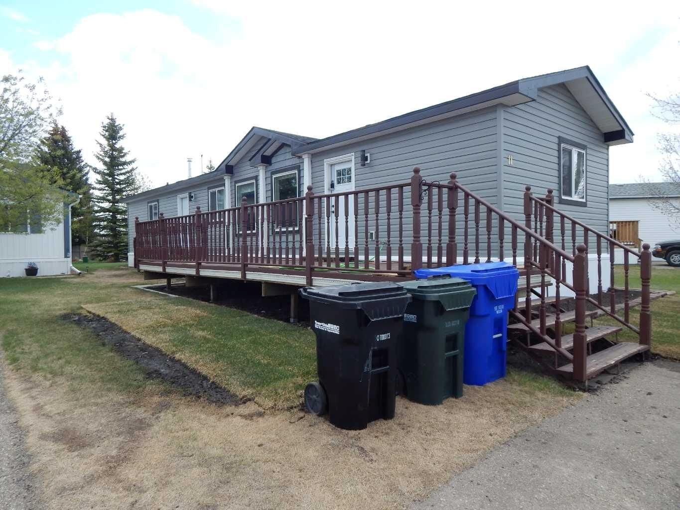 Property Photo: 5210 65 Avenue #11 AB T4H 1W7