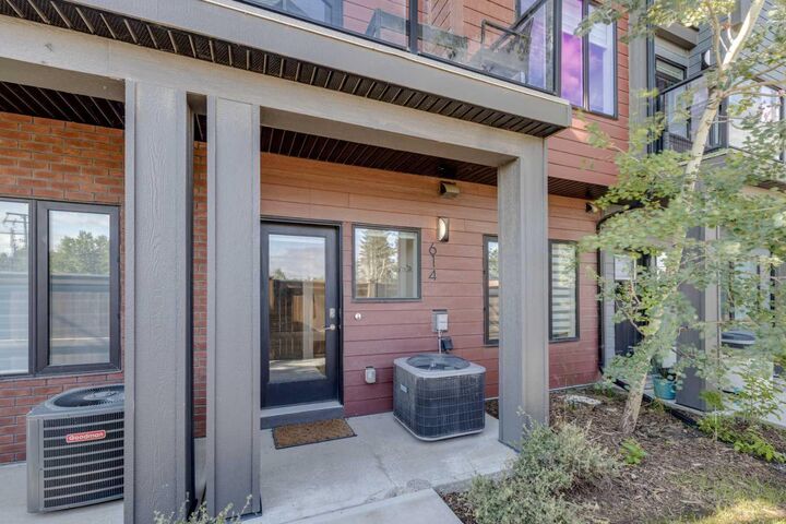 Property Photo: 614 Greenbriar Common NW AB T3B 6J2