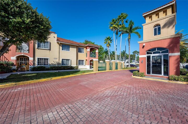 Property Photo:  15250 SW 134th Pl 102  FL 33177 