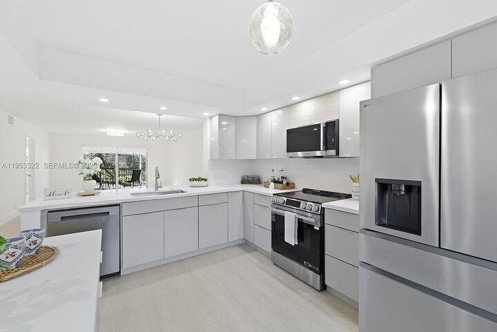 Property Photo:  1300 SW 125th Ave 306K  FL 33027 