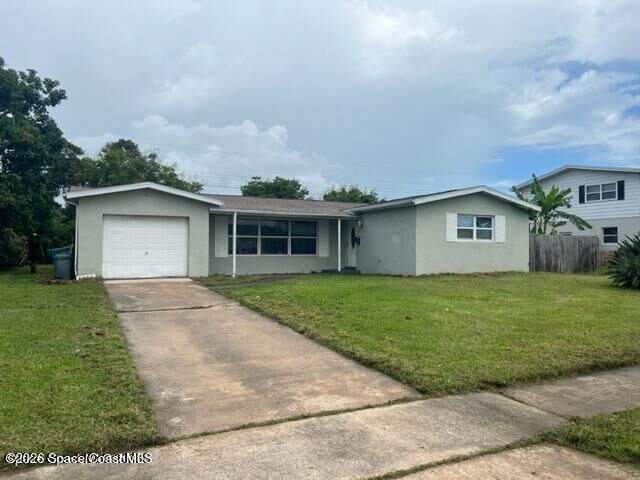 Property Photo:  1716 Ixora Drive W  FL 32935 
