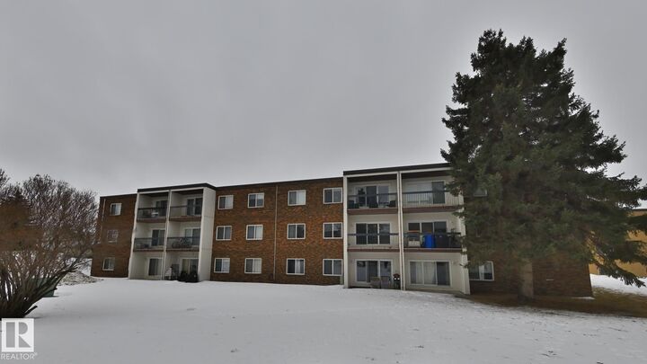 Property Photo: 11420 40 Avenue NW 303 AB T6J 0R5