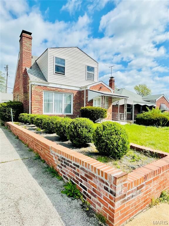 Property Photo:  1439 McLaran Avenue  MO 63147 