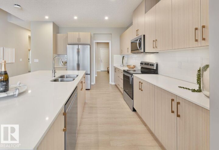 Property Photo:  8727 224 Street NW  AB T5T 7W6 