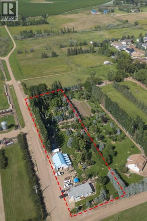 Property Photo: 145006 Cassils Road AB T1R 1B4