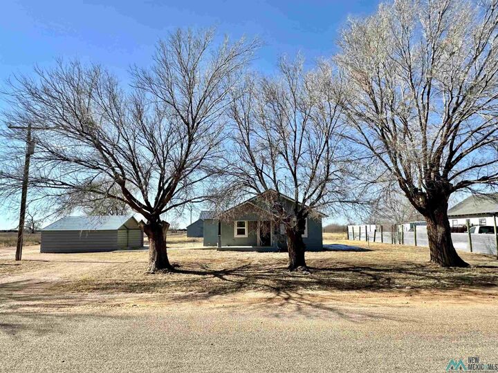 Property Photo:  348 S Roosevelt Road R1/2 Road  NM 88130 