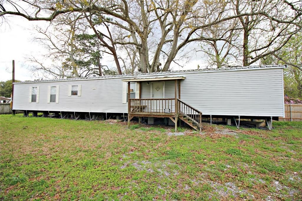 Property Photo:  10856 Highway  23  LA 70037 