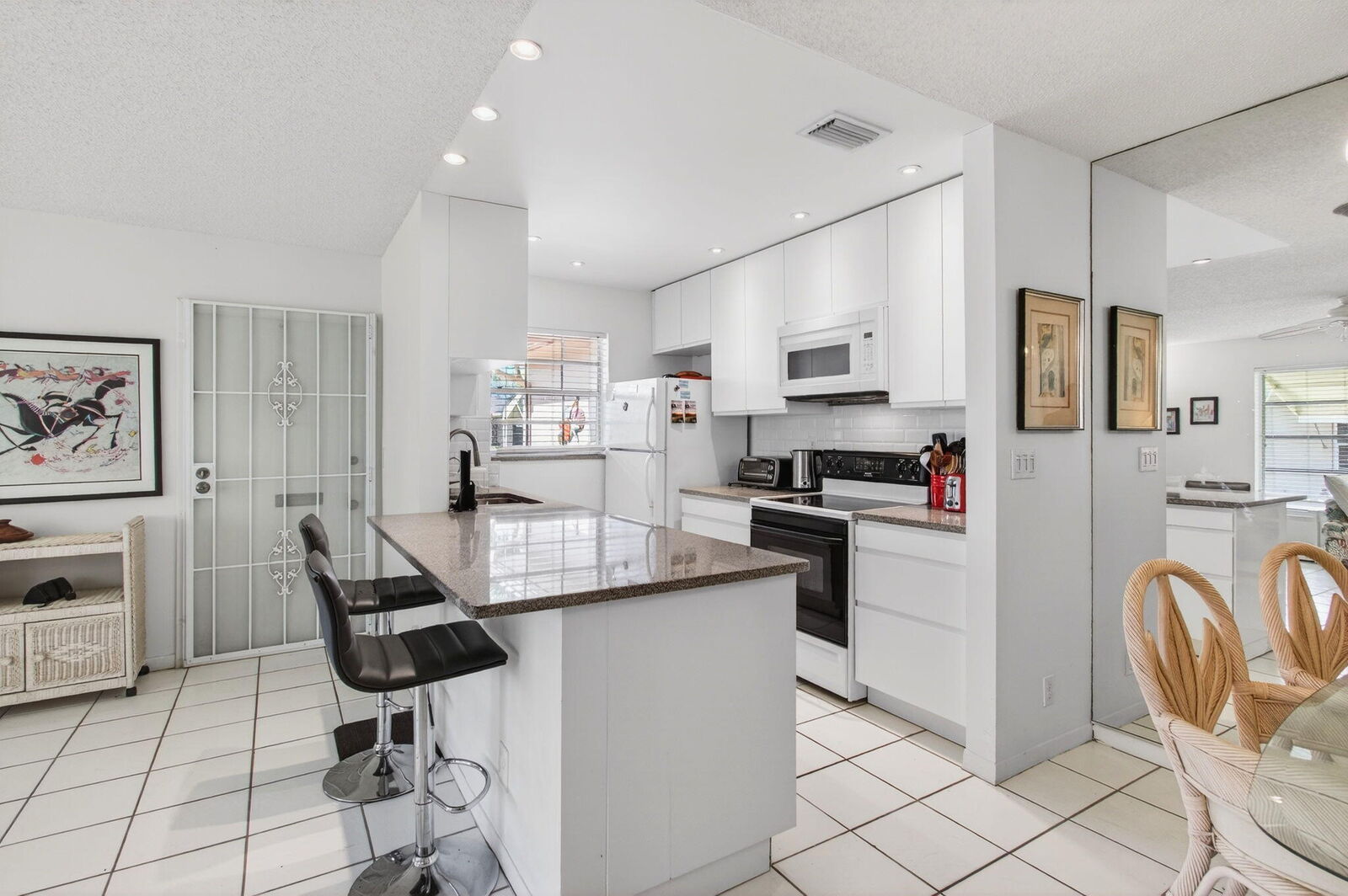 Property Photo:  1327 High Point Way SE D  FL 33445 