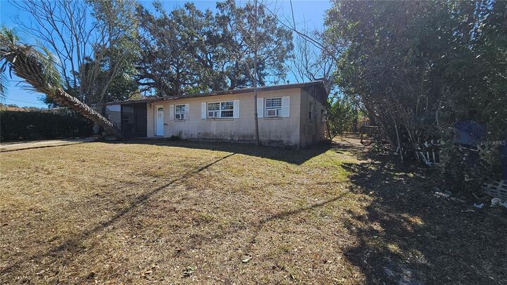 Property Photo:  2115 Woodland Boulevard  FL 34748 