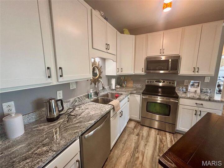 Property Photo:  885 Forest Avenue 303  MO 63088 