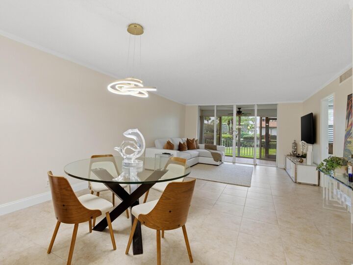 Property Photo:  911 Gardenia Drive E 150  FL 33483 