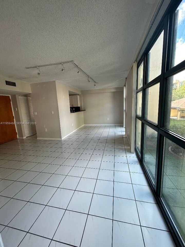 Property Photo:  11780 SW 18th St 202-2  FL 33175 