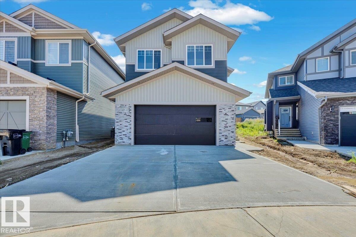 Property Photo:  1119 Gyrfalcon Crescent NW  AB T5S 0S5 