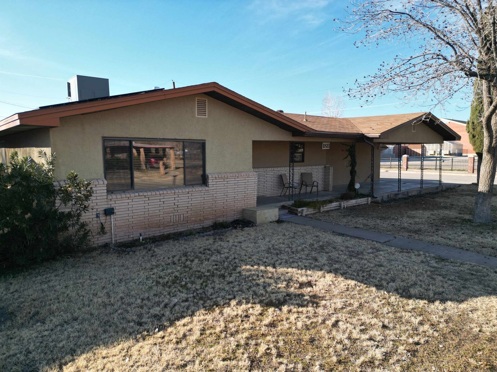 Property Photo:  1811 Alamo Ave  NM 88310-6206 