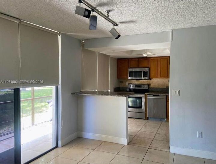 Property Photo:  665 NE 195th St 119  FL 33179 