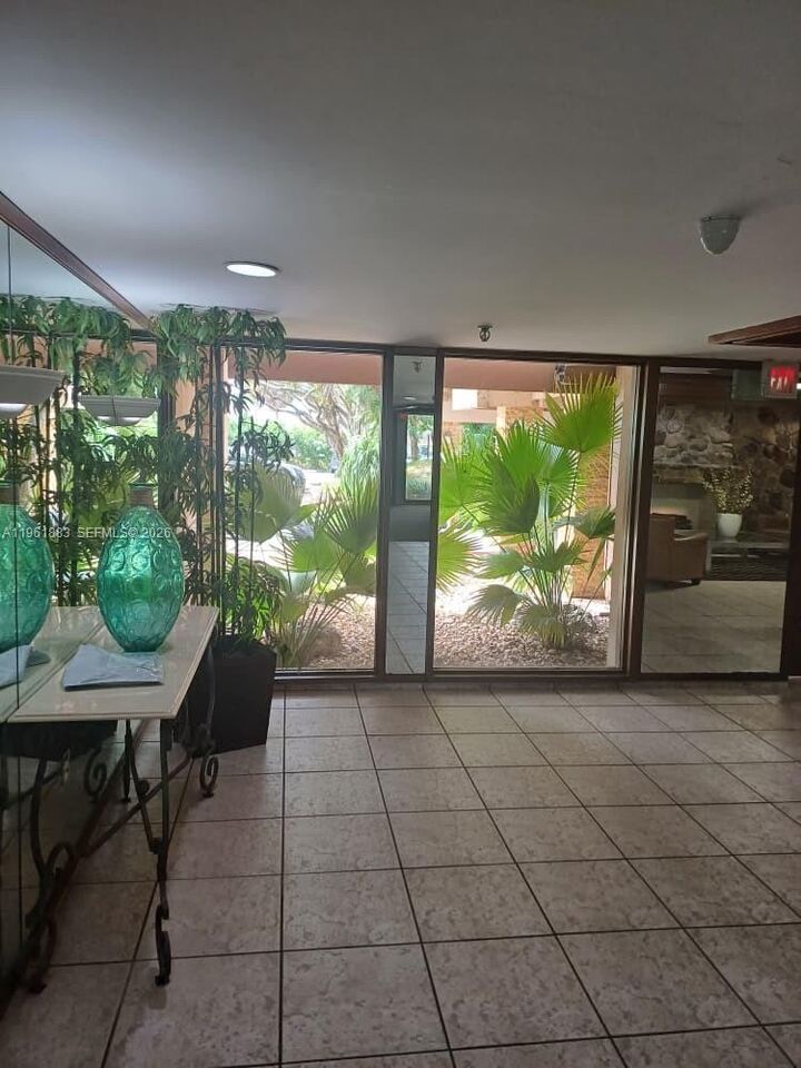 Property Photo:  665 NE 195th St 119  FL 33179 