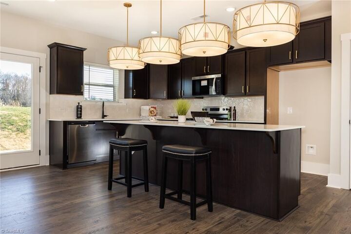 Property Photo:  7142 Commodity Court 49  NC 27302 