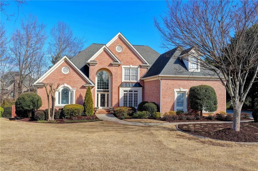 Property Photo: 6905 Blackthorn Lane GA 30024