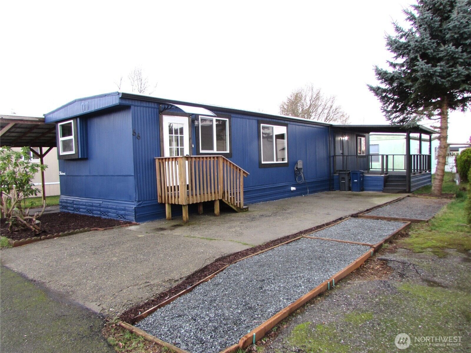 Property Photo:  16600  25th Avenue NE Sp 66  WA 98271 
