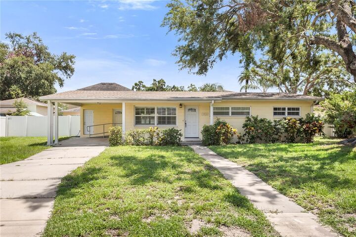 Property Photo:  3414 W Carrington Street  FL 33611 