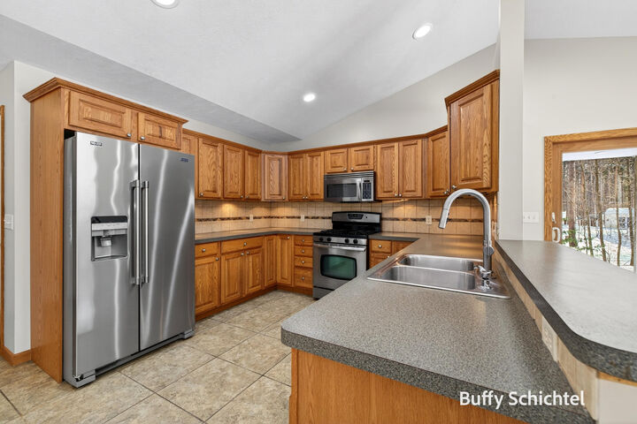 Property Photo:  992 Tibalew Drive NW  MI 49345 