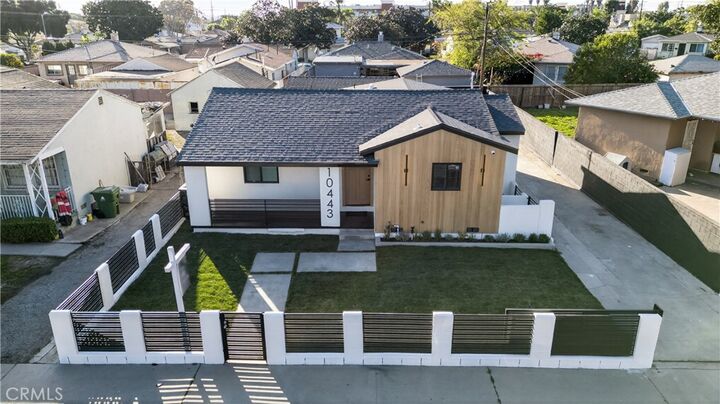 Property Photo: 10443 E Zamora Avenue CA 90002