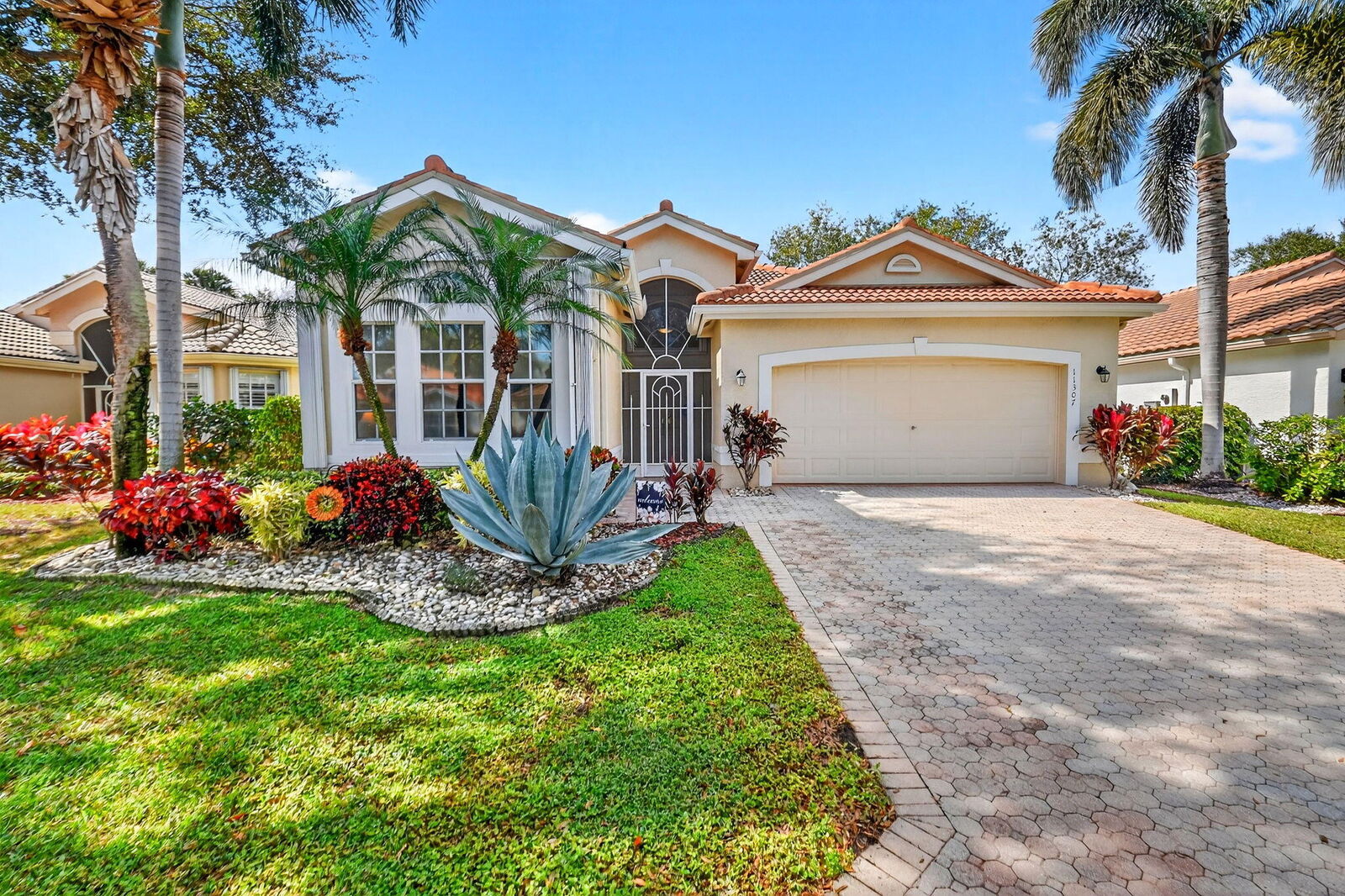 Property Photo:  11307 Ola Avenue  FL 33437 