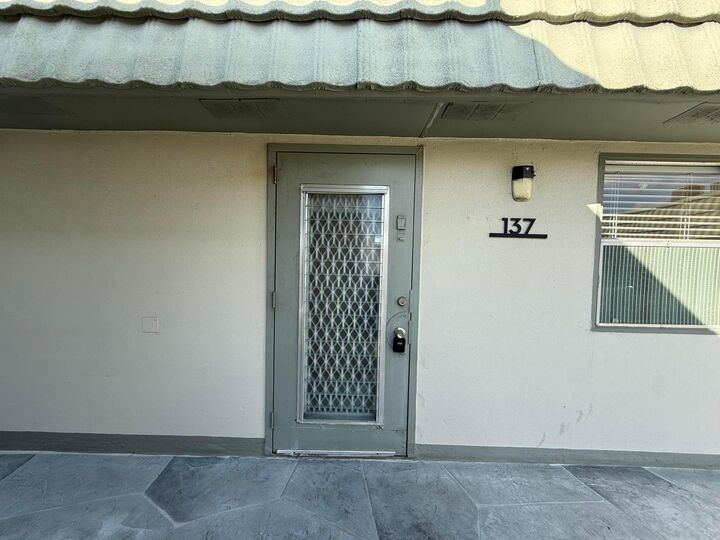 Property Photo:  137 Monaco C  FL 33446 