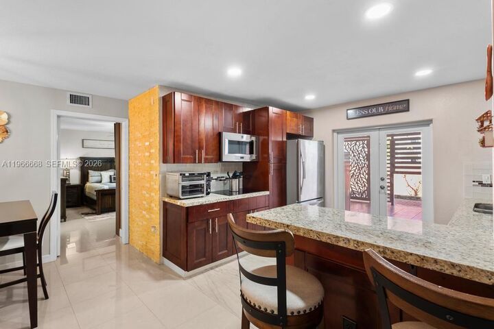 Property Photo:  10951 W Okeechobee Rd 101  FL 33018 