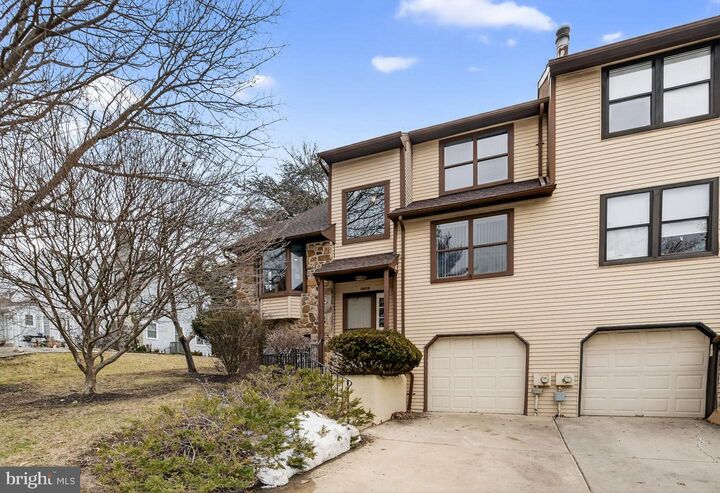 Property Photo:  8609 Trumbauer Drive L-57  PA 19038 