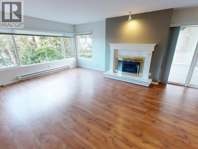 Property Photo: 101-4421 Ontario Ave BC V8A 5B6