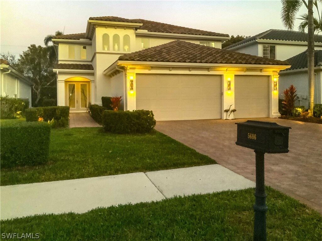 Property Photo:  5686 Lago Villaggio Way  FL 34104 