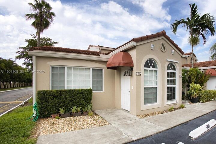Property Photo:  6910 NW 166th Ter 1201  FL 33014 
