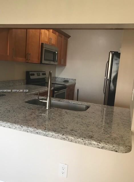 Property Photo:  10018 NW 4th St 203  FL 33024 