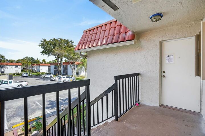 Property Photo:  9730 Hammocks Blvd 201-28  FL 33196 
