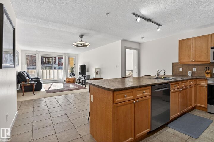 Property Photo: 400 Palisades Way 222 AB T8H 0H4