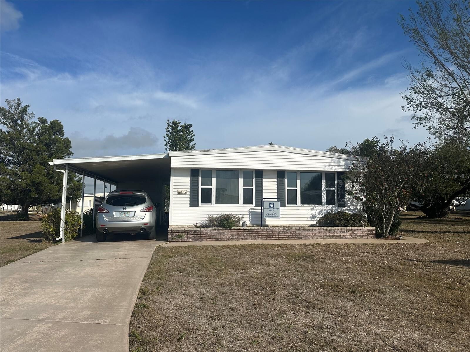 Property Photo:  6882 Holo Court  FL 34287 