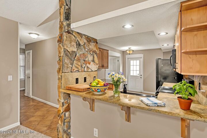 Property Photo:  11764 Wattle Tree Road N  FL 32246 