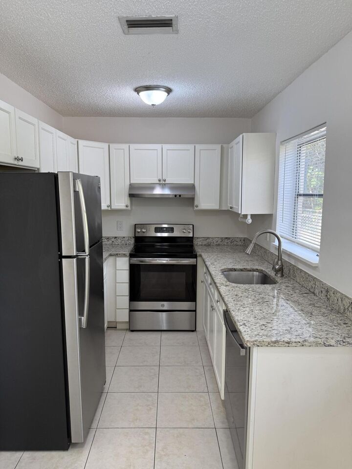 Property Photo: 6575 NE 7th Avenue FL 33487