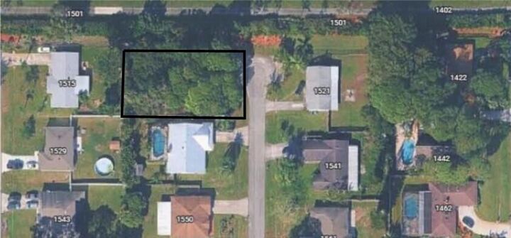 Property Photo: 1550 SE Sutton Street FL 34953
