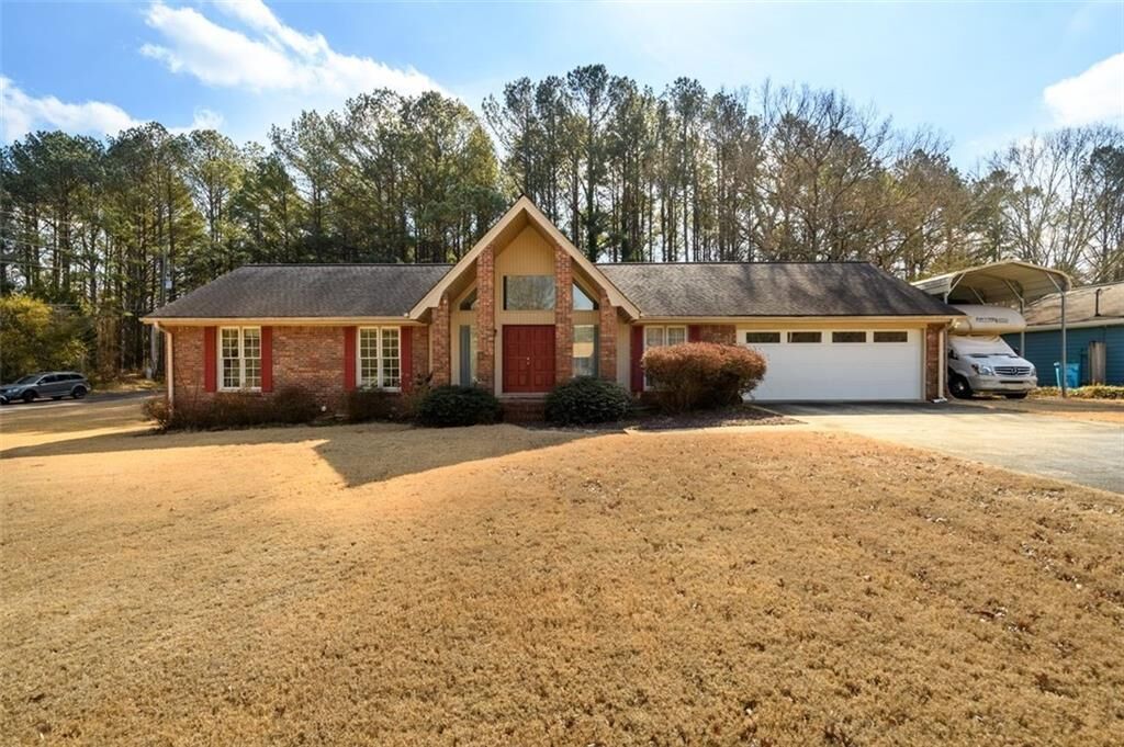 Property Photo:  4304 Riverside Drive SW  GA 30047 