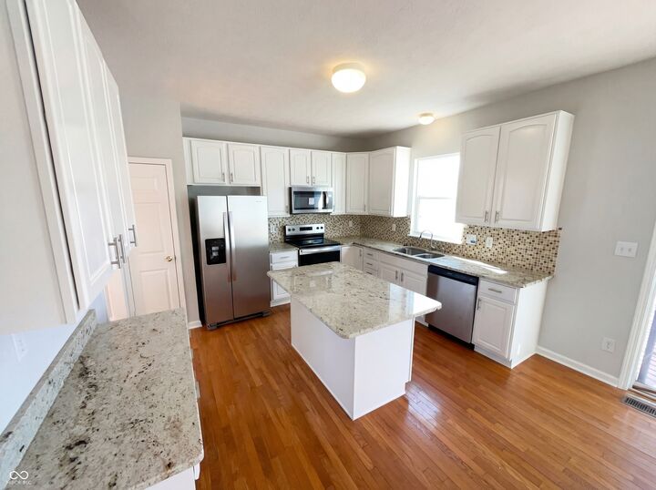 Property Photo:  6767 Woodcliff Circle  IN 46077 