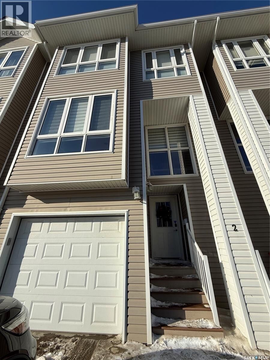 Property Photo:  2 697 Sun Valley Drive  SK S4A 2X7 