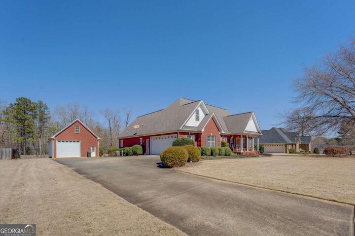 Property Photo:  212 Willow Ridge Lane  GA 30233 