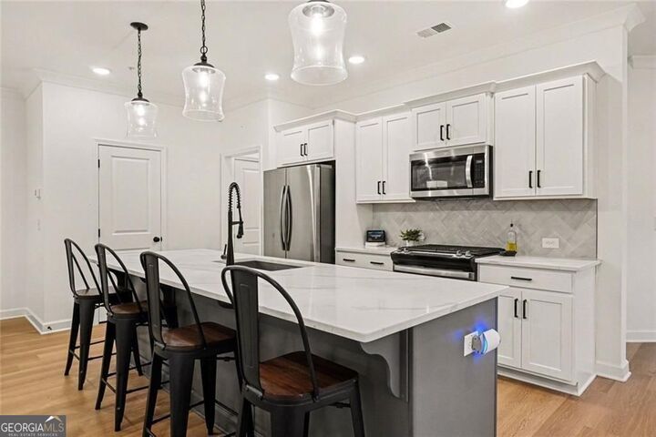 Property Photo:  1628 Ruskin Way  GA 30062 