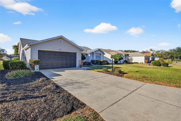 Property Photo:  25113 Riverwalk Drive  FL 34748 