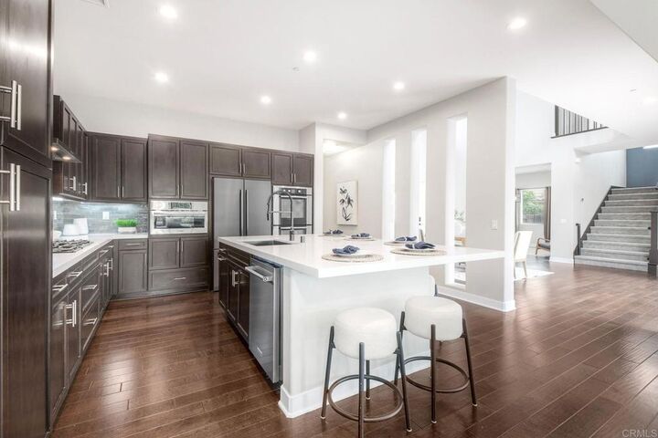 Property Photo:  7060 Sitio Caliente  CA 92009 