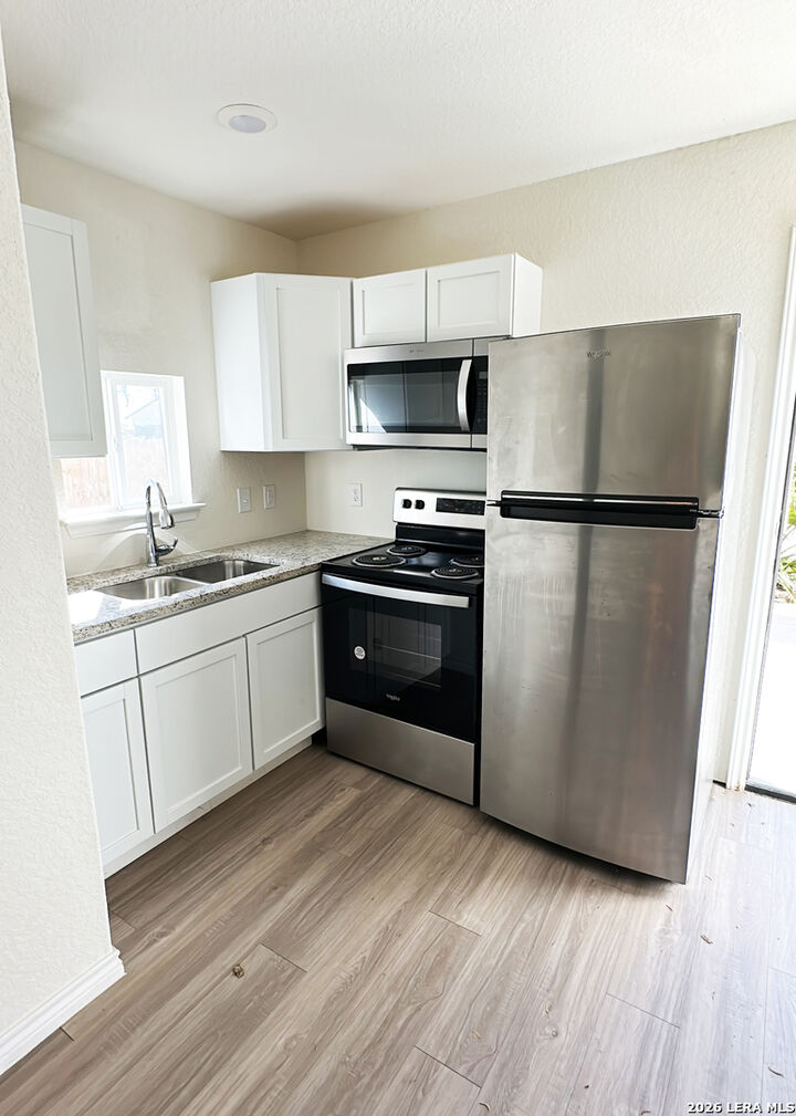 Property Photo:  7302 Mary Abbott 201  TX 78221 