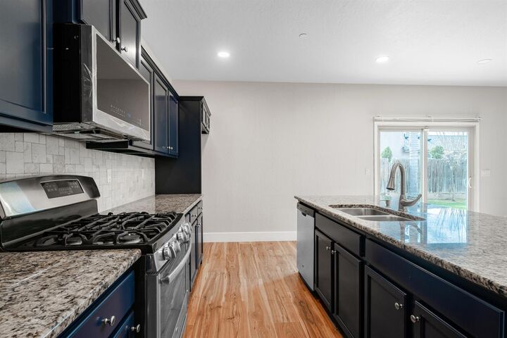 Property Photo:  6689 W Lucas Drive  CA 93722 